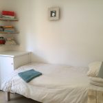 6. Third bedroom with single bed and washing machine in cupboard