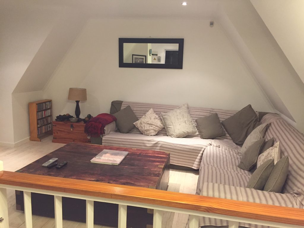 8. Upstairs living area with DSTV and free WiFi